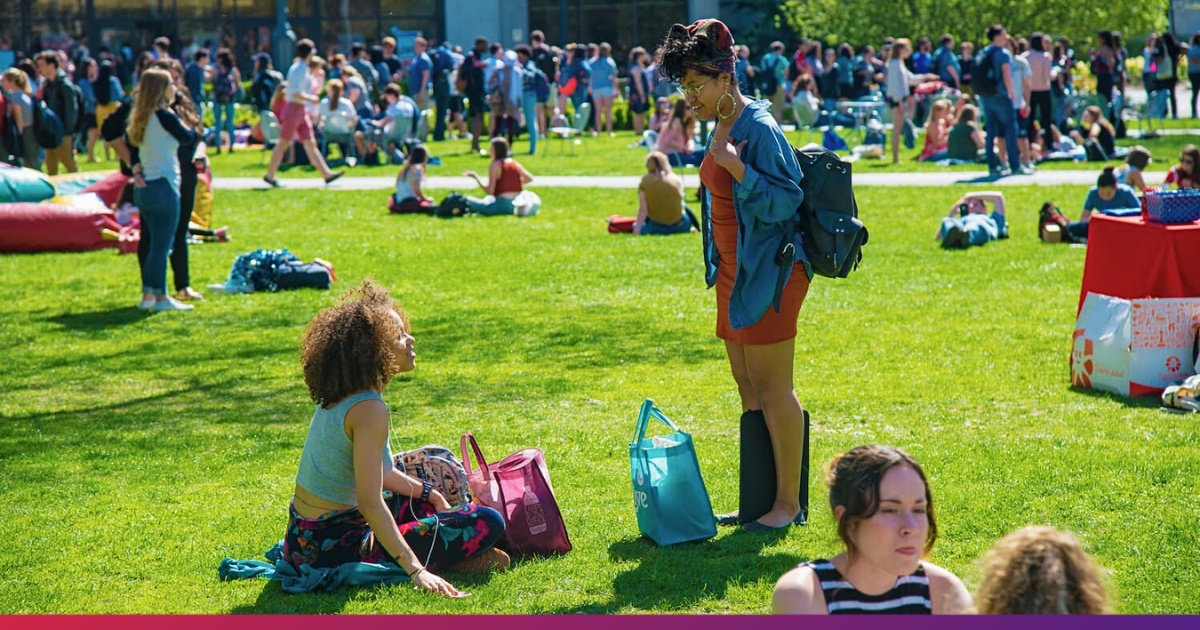 Two Students Chatting on the Quad at American University
