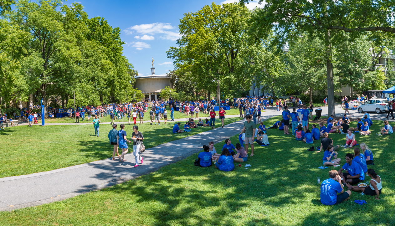 Students on AU Quad during a sunny day