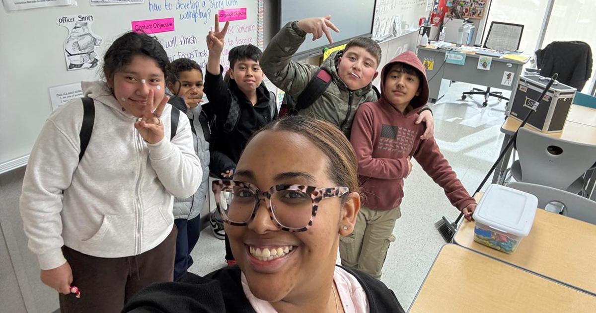 Nicole Alvarez with students in her classroom.