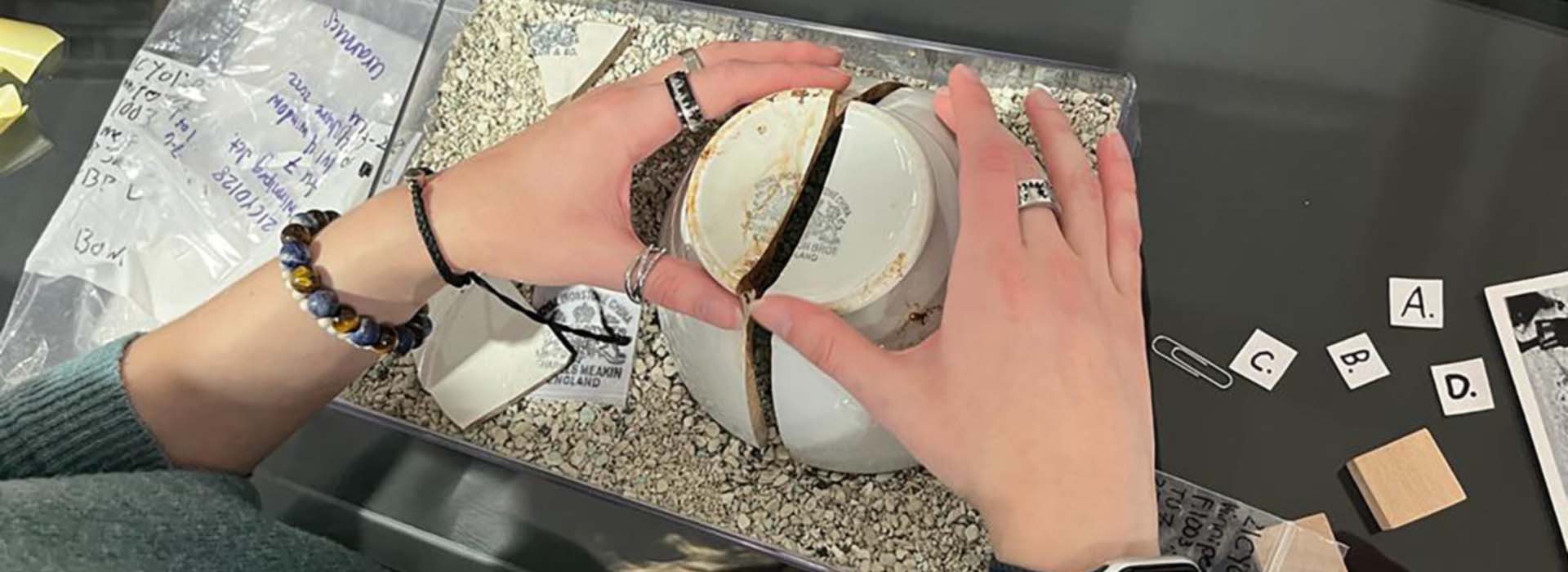 Student assembles broken bowl from Winnipeg Junction