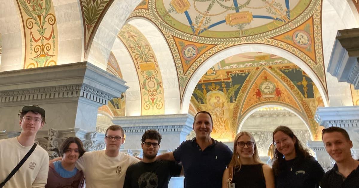 Students with the gorgeous Library of Congress ceiling frescoes.
