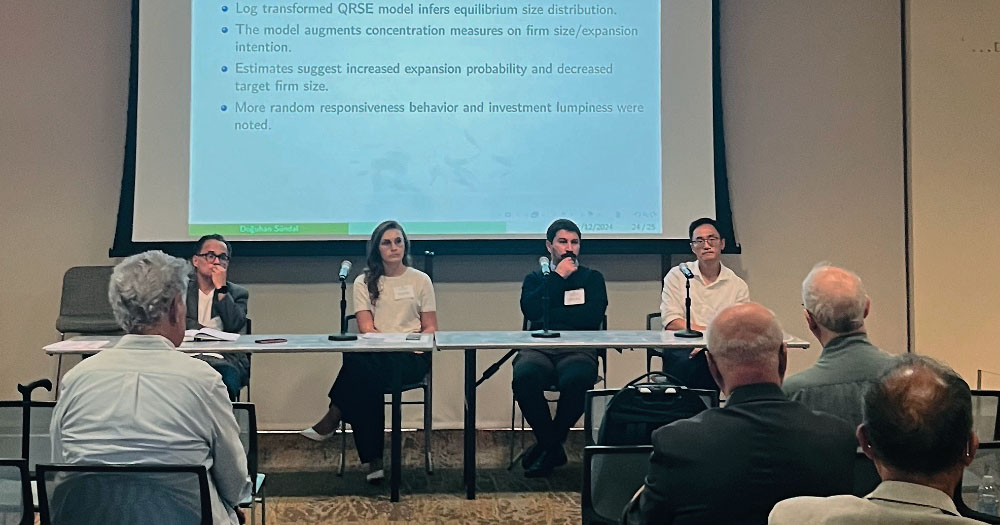 Panelists listen to audience questions