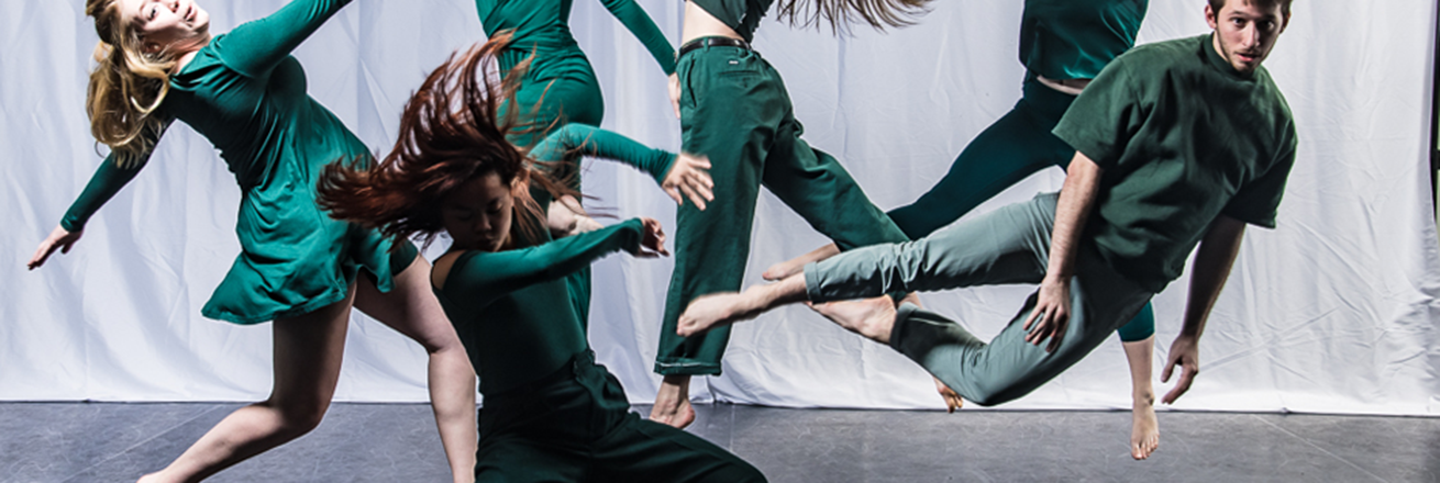 Figures wearing green leap in space