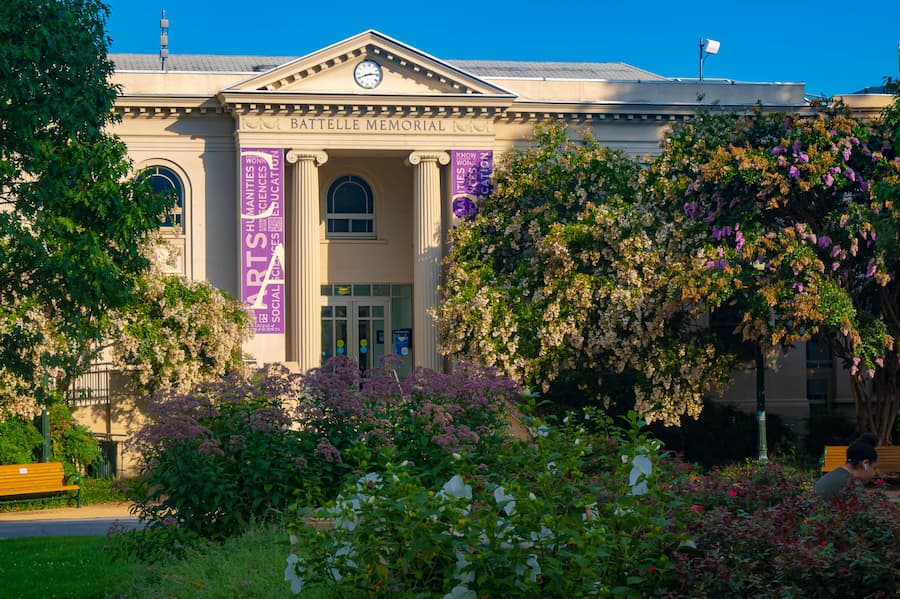 Battelle Tompkins Memorial Building surrounded by foliage