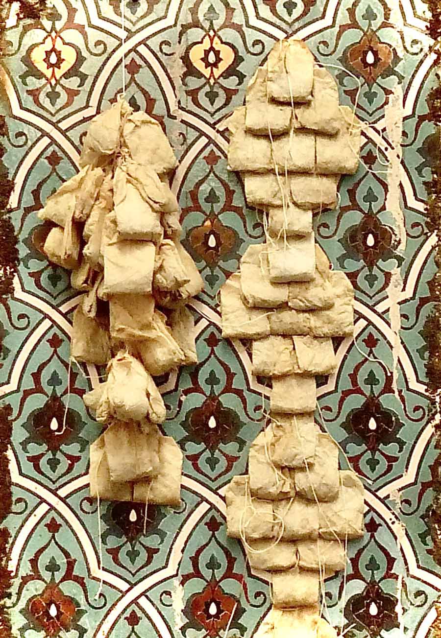 Phaedra Askarinam, Detail of Shanbeh (Saturday). A pattern painted on canvas with a sculptural arrangement of teabags. 