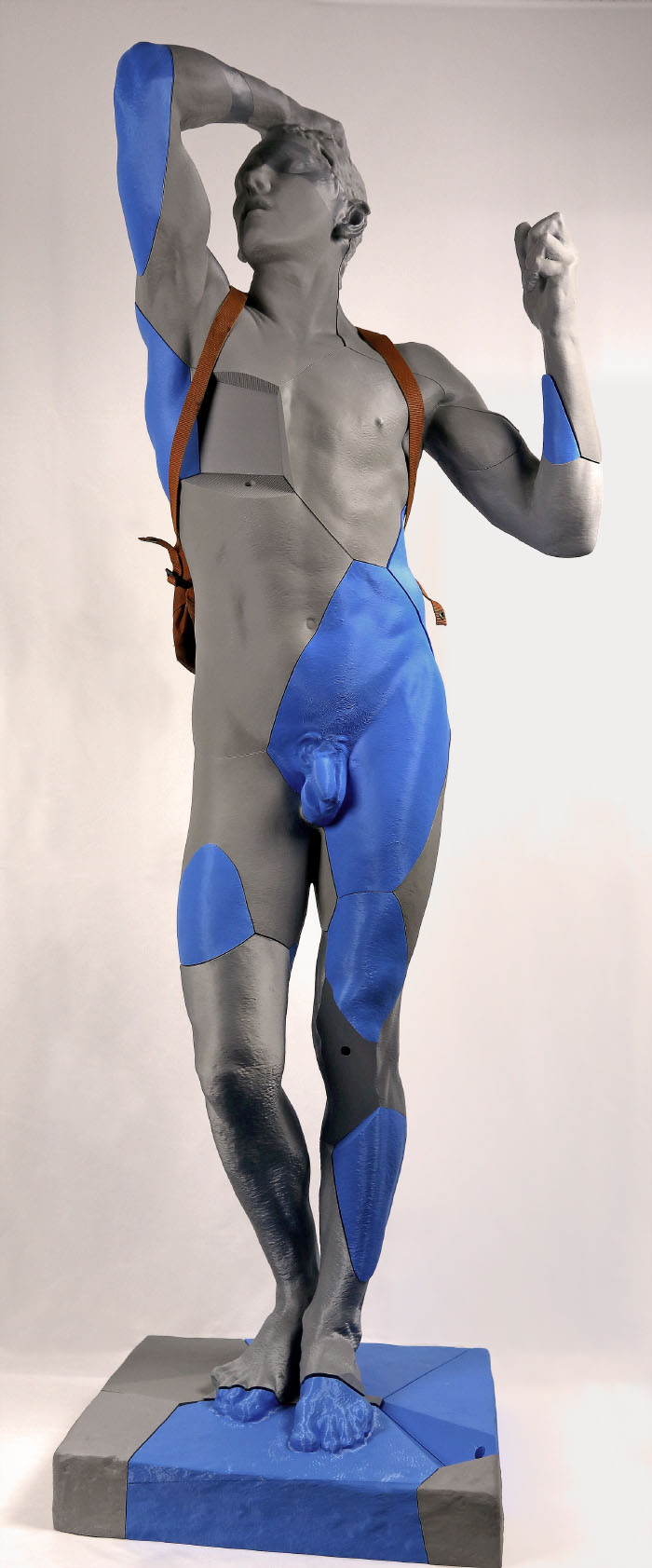 Tae D Kjim-James, Excavated Bronze: After Rodin, 2025. Male nude in grey wearing a holster; some sections are replaced with deep blue, half of the chest is missing.