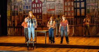 Students performing Disarming Girls in Greenberg Theatre