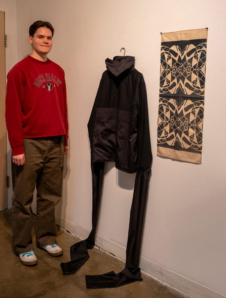 Michael Dodson with textile artwork