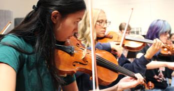 Student orchestra performing