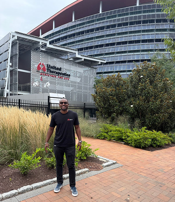 Franck Uwiragiye outside UT’s Silver Spring headquarters