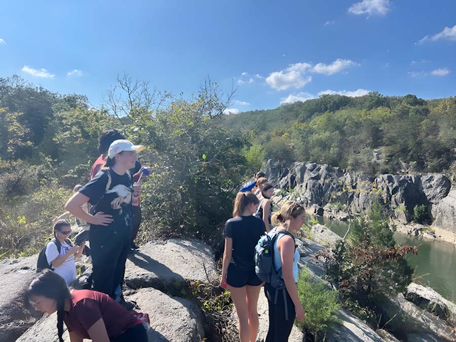 Students looking out over river