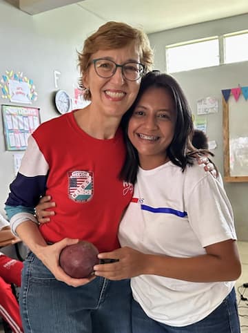 Margaret Johnson with student.