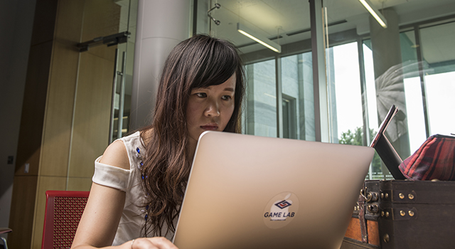 Game Lab student working on laptop.