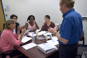 A professor talking to students