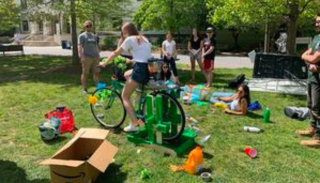 Junior Sarah Gruesser tests out a newly built smoothie bike Junior Sarah Gruesser tests out a newly built smoothie bike