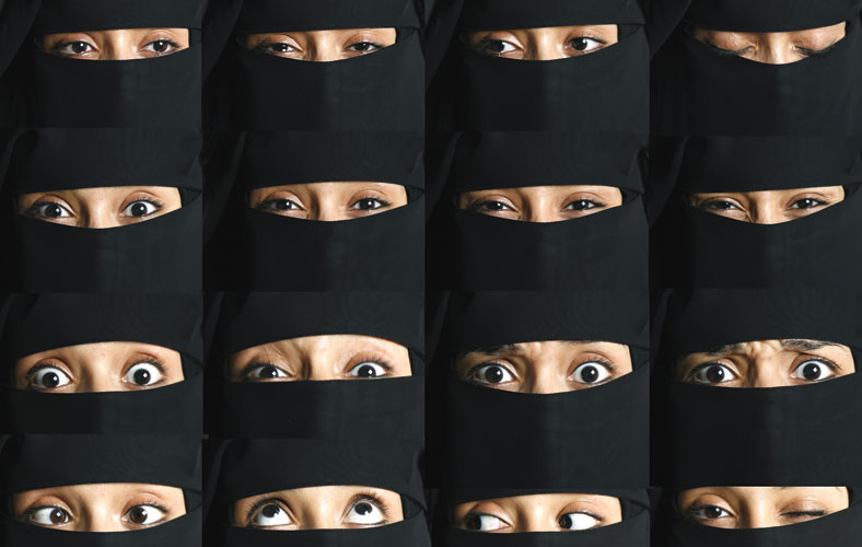 A collection of women in veils. Only their eyes are showing