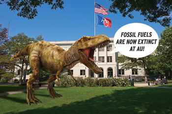 dinosaur in front of Mary Graydon Student Center proclaiming that fossil fuels are extinct at AU