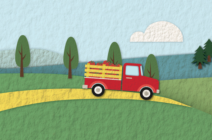 an illustration of a farm truck carrying produce
