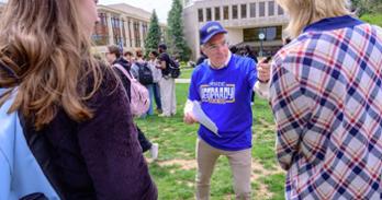 Sam Buttrey asks AU students trivia questions during a Jeopardy! event on the quad last week. Photo by Jeff Watts.