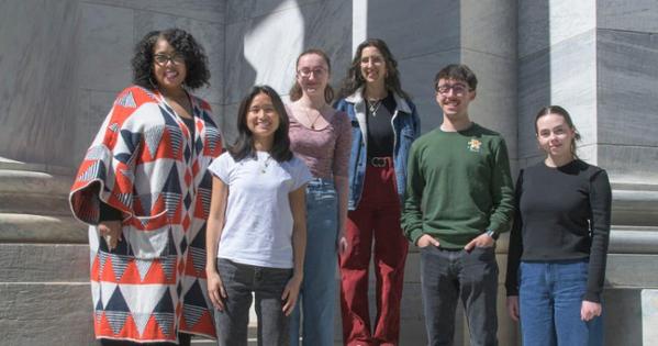 From left: SOC professor Sherri Williams and her students are producing work that will have the potential to be published in the Nation later this year. Photo by Shaun Schroth.