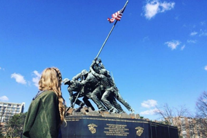 Lydia in front of a war memorial