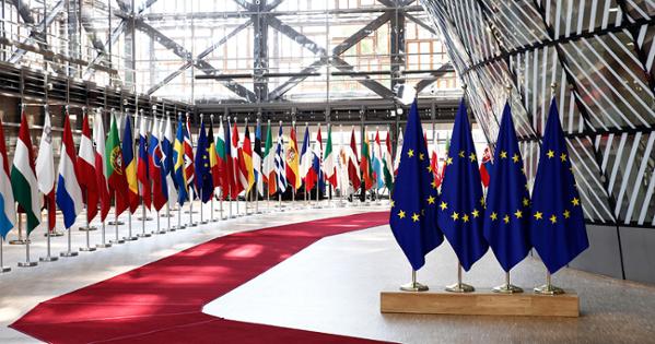 Flags from across Europe are lined up in the European Union headquarters