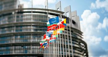 European flags flying in front of European Union embassy