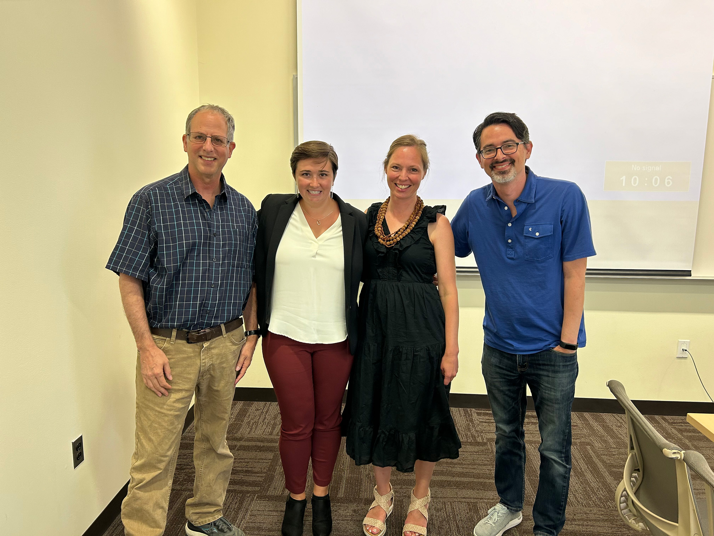 Grace Benson with Professors Lauren Carruth, Boaz Atzili, and Joe Young