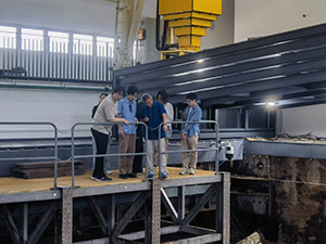 Hansong Li with a group of people on a ship