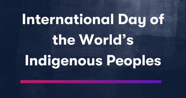 The text "international day of the world's Indigenous peoples" is written in white on a dark gray textured background