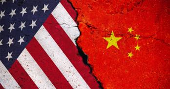 US and China flags with a crack in between them