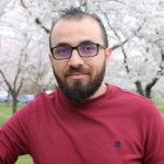 AU for American University in blue surrounded by a blue bordered box