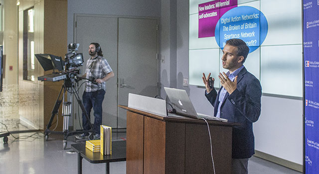 Professor Filippo Trevisan giving a presentation