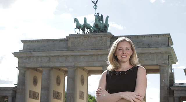 Melissa Yaeger stands in front of the Brandenburg gate in Berlin.