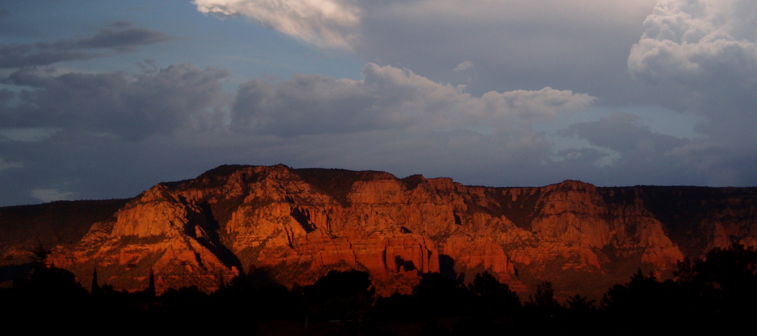 Landscape of red rock in a storm