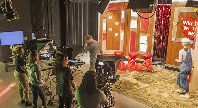 Students film on a tv set