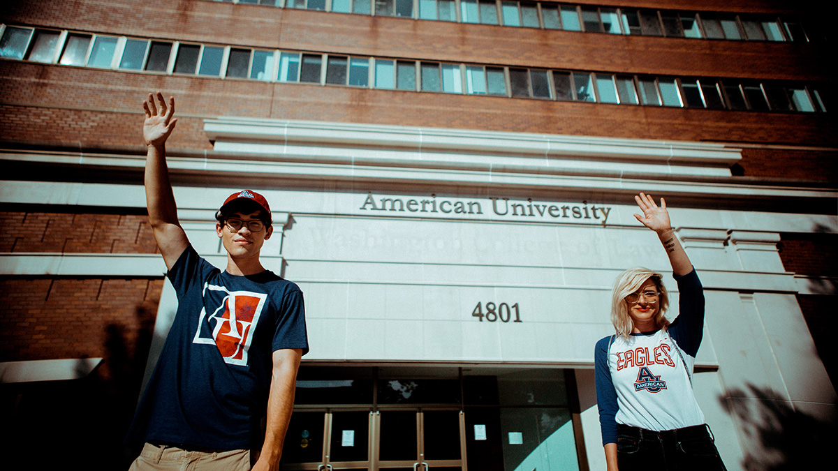 Two AU graduates who raised their hands for equity in education.