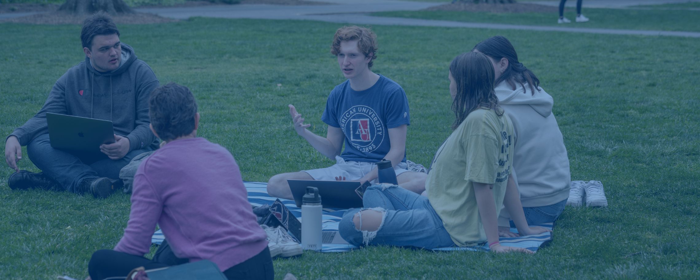 students in a circle talking