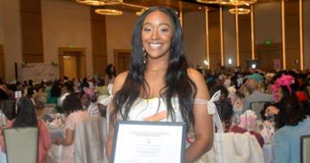 Jayla Meeks celebrates her 2026 J. Franklyn Bourne Bar Association Scholarship Award.